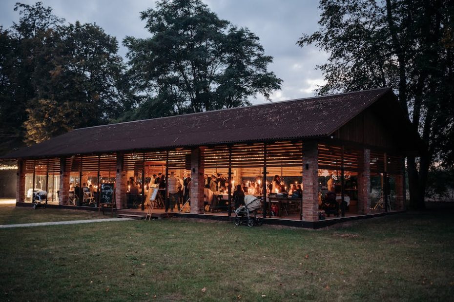 A Wedding Venue with Guests Inside Photographed from the Outside