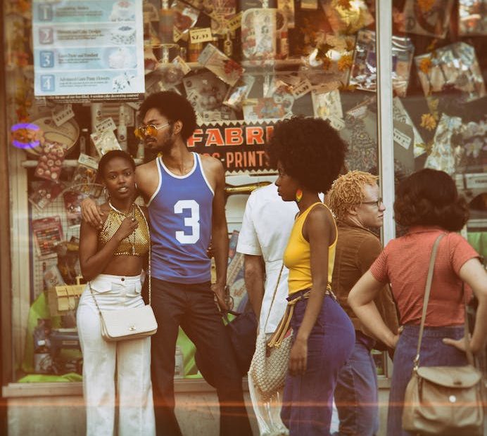 People Infront Of A Store