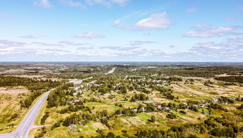 Aerial View of Houses in the Grassland